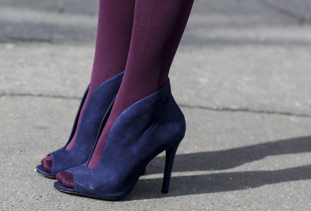 Vestidos mini ficam melhor com sandálias abotinadas ou ankle boots (Foto: Getty Images)